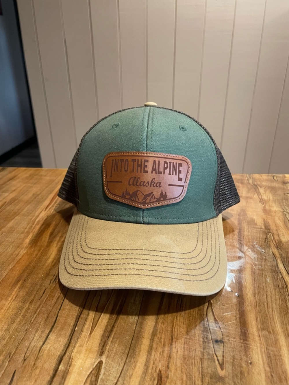 Into The Alpine Alaska Green & Tan Trucker Hat